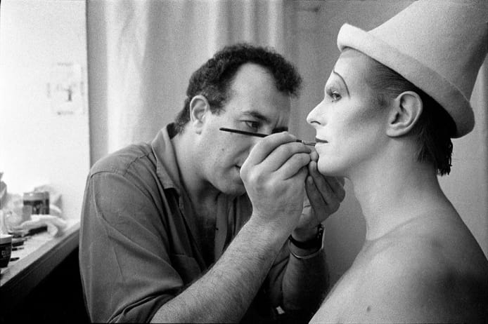 A person applying makeup on a person's face

AI-generated content may be incorrect.